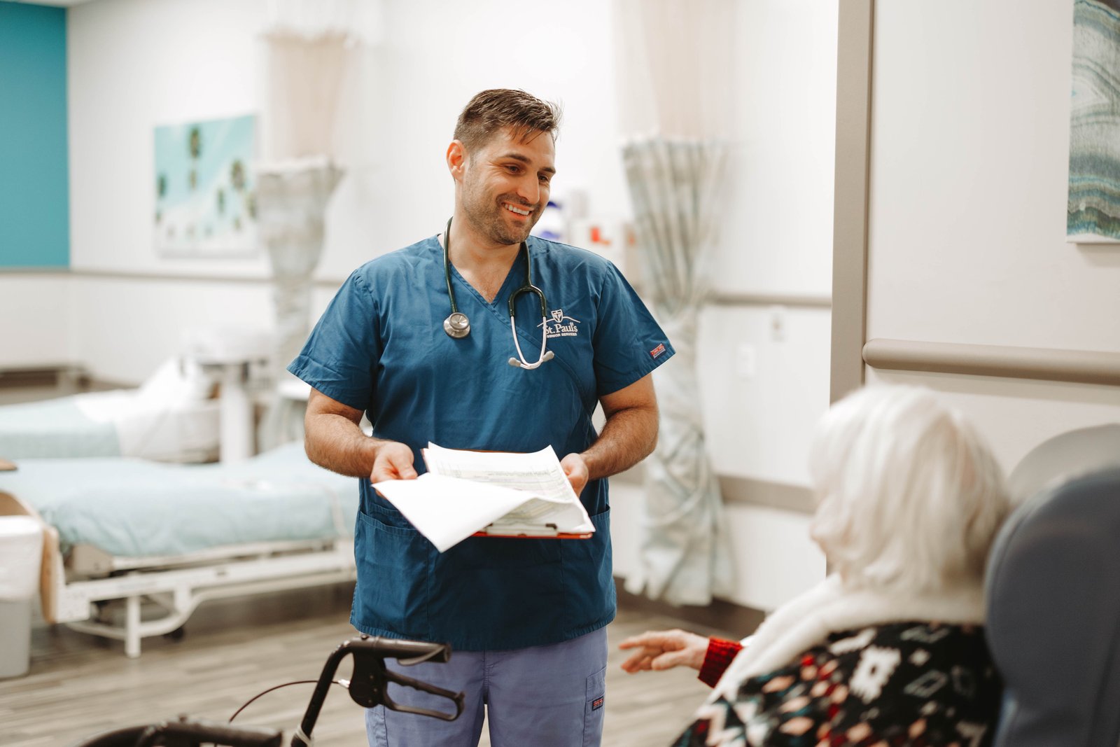 Home care nurse assisting a participant